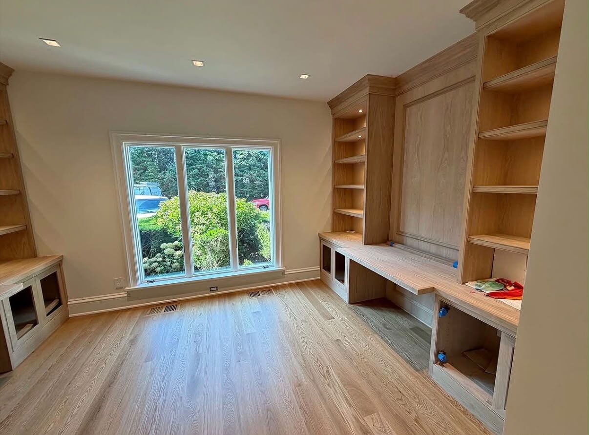White oak built-ins in a study during installation